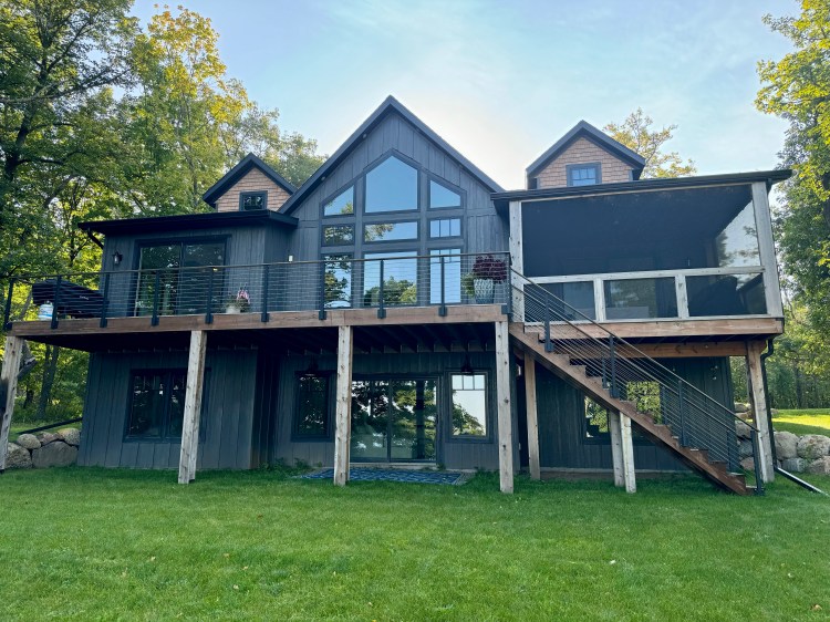 A custom-built cabin on a Minnesota lake combines modern mountain and Scandinavian&nbsp;styles